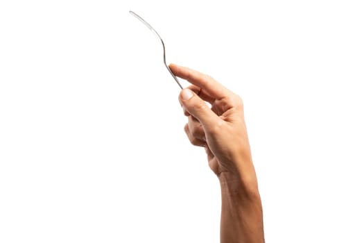 black male hand holding a silver fork on an isolated white