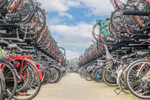Netherlands. Two-level bicycle parking near Amsterdam Central Station. Lots of different bikes