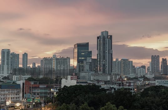 Bangkok, Thailand - May 20, 2024 - Gorgeous scenic of sunset with beautiful cloud and sky over metropolitan city. Bangkok city skyscrapers after sunset with Beautiful sky background, They can be used as Wallpaper, Copy space, Selective Focus.