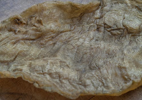 Detail of Fish Maw Soup or Dried Fish Stomach (Dried Fish Bladder). Chinese dried food, Healthy eating lifestyle concept, Space for text, Selective focus.