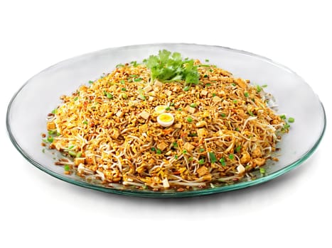Vegetarian pad Thai with tofu egg and tamarind sauce served on a transparent glass plate. Food isolated on transparent background.