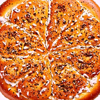 Bagel mandala a mandala of toasted bagels with cream cheese spreading and seeds falling. Food isolated on transparent background.