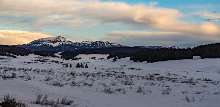 Mountains covered with snow in the evening at sunset, USA