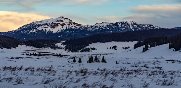 Mountains covered with snow in the evening at sunset, USA