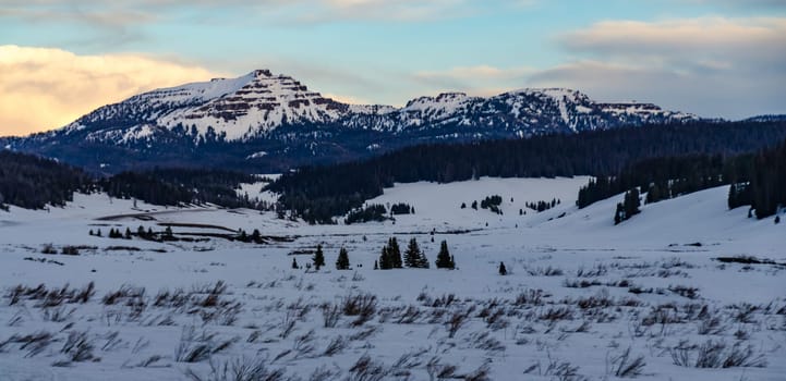 Mountains covered with snow in the evening at sunset, USA