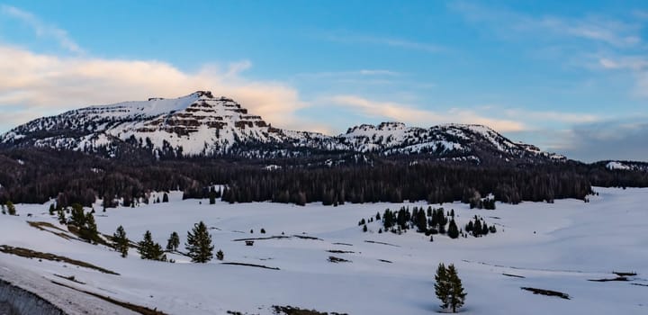 Mountains covered with snow in the evening at sunset, USA