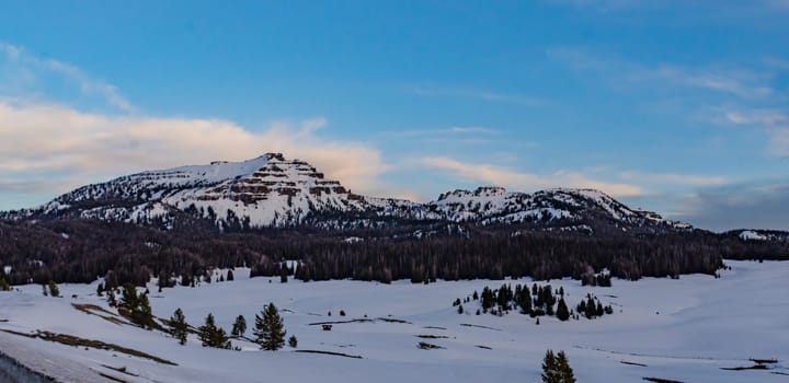 Mountains covered with snow in the evening at sunset, USA