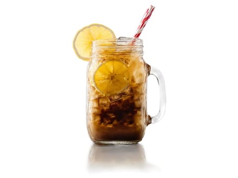 Iced coffee in a mason jar glass straw and lemon slice dynamic ice splash fresh. Drink isolated on transparent background.