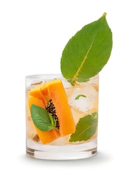 Caipirinha with slice of papaya and sprig of mint in rocks glass. Drink isolated on transparent background.