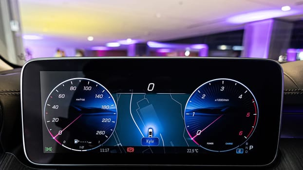 Digital dashboard showing the speedometer and tachometer. Luxury automotive technology, high-performance vehicle interfaces, and modern car interiors.