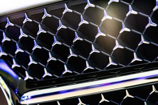 Kyiv, Ukraine - September 12, 2024: Mercedes-Benz logo on a luxury car grille, highlighting the brand's sleek design and premium craftsmanship