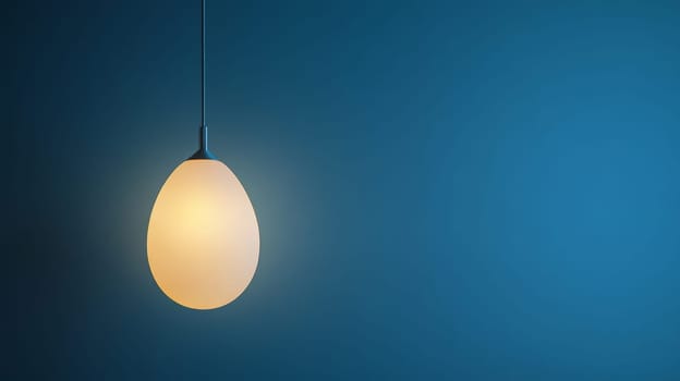 Pendant lamp against blue background, modern interior lighting concept.