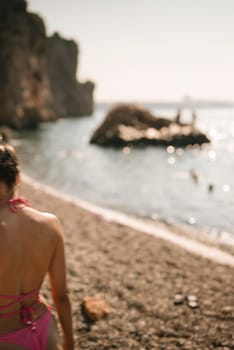 A tranquil and picturesque beach scene capturing a carefree and joyful walk along the waters edge at sunset