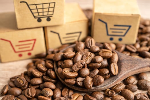 Box with shopping cart logo symbol on coffee beans, Import Export Shopping online or eCommerce delivery service store product shipping, trade, supplier concept.