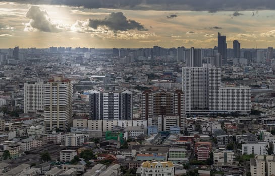 Bangkok, Thailand - 04 Sep, 2024 - Amazing Clouds and Sky over Metropolitan City before sunset. Bangkok city skyscrapers with Dramatic sky background. use it as your wallpaper, poster and banner design, Space for text, Selective focus.