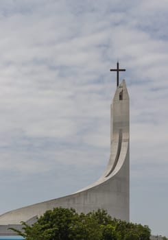 Bangkok, Thailand - 16 Sep, 2024 - Architecture exterior design of The Blessed Sacrament Church with sky background. Minimalist modern style of Roman Catholic Church in Taling Chan, Space for text, Selective focus.