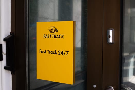 Sign at entrance to the building Fast Track 24 hours 7 days week. Company office for assistance in fast passage and movement of tourists