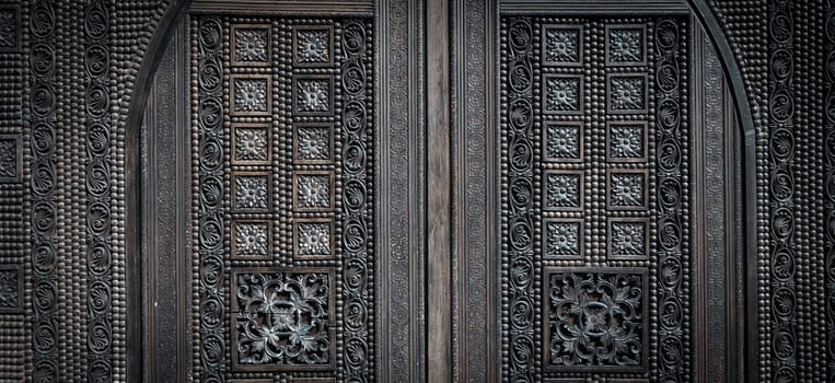 Beautiful wood carving, handmade door in muslim oriental style. Exploring arabic countries.