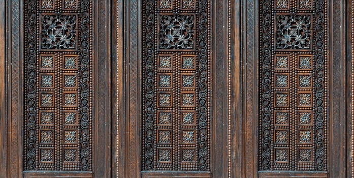 Beautiful wood carving, handmade door in muslim oriental style. Exploring arabic countries.