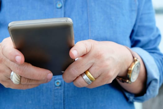 image of older woman using smart phone