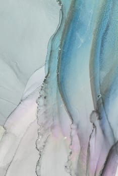 An artistic composition showcases gentle waves of blue, lavender, and white blending together, creating a calm and soothing visual experience with soft edges and flowing lines.