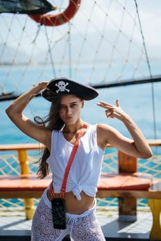 Enjoying a funfilled piratethemed photo shoot aboard an exciting ship, beautifully showcasing confidence and style