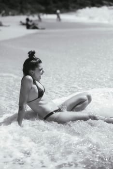 Enjoying a serene and peaceful moment by the sea, beautifully capturing the pure joy of a perfect beach day