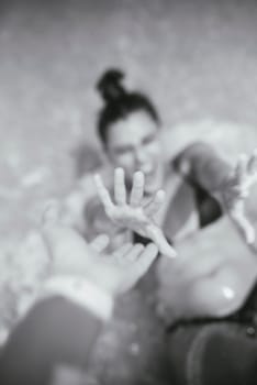 A powerful and moving image depicting a profound moment of emotional connection and reaching out for help