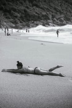 A serene beach scene beautifully captured in striking black and white, emphasizing relaxation and deep tranquility