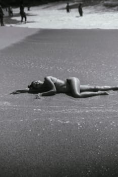 A serene and peaceful moment artfully captured on the beach, powerfully showcasing beauty and tranquility