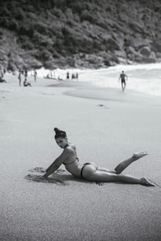 A serene and tranquil moment has been beautifully captured on a beach, showcasing both relaxation and natural beauty