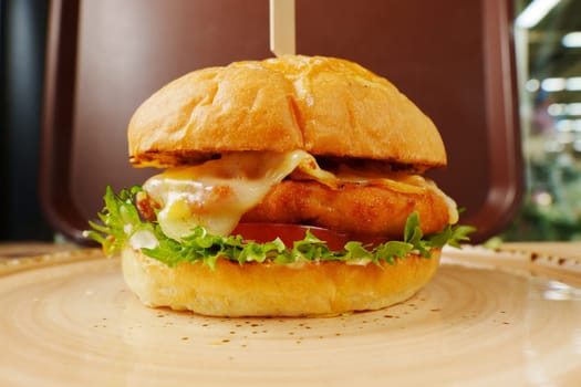 This delicious cheeseburger features two layers of melted cheese, crisp lettuce, and a succulent beef patty