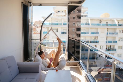 Imagine enjoying a tranquil moment on a beautifully styled balcony, offering stunning views of the vibrant city
