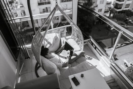 A truly serene moment has been beautifully captured in the stylish and inviting reading area of a cozy apartment