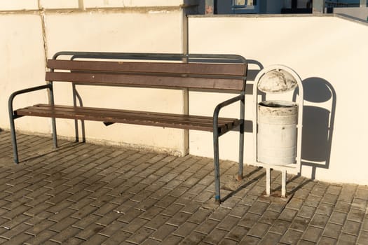 bench outdoor rest city brown pattern texture wood sunlight shadow architecture resting design