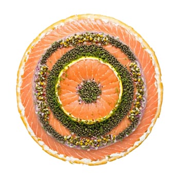 Lox mandala a circular pattern of smoked salmon lox with capers and onions scattering. Food isolated on transparent background.