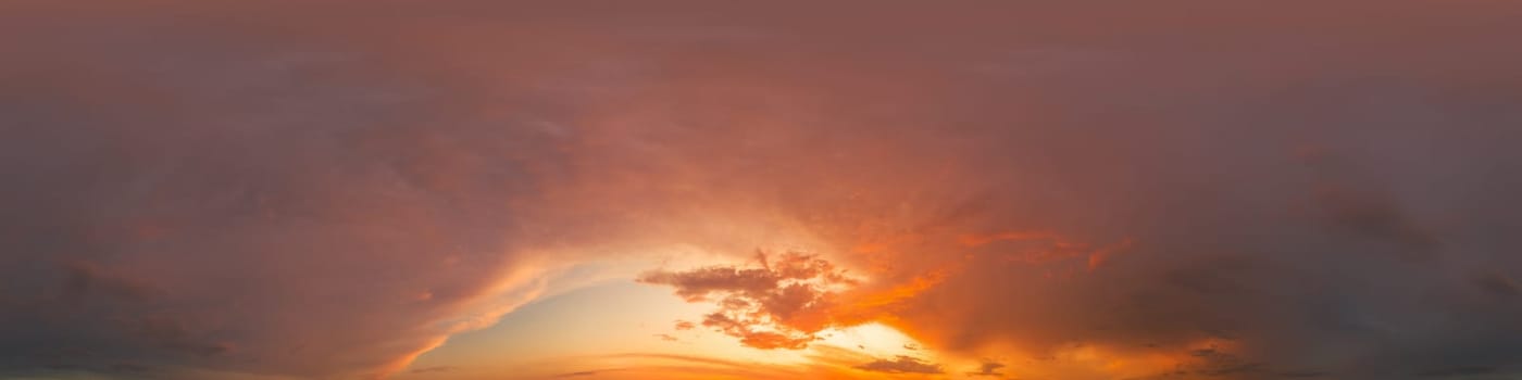Golden glowing red orange overcast sunset sky 360 hdr panorama. Seamless spherical equirectangular panorama. Sky dome or zenith for 3D visualization and sky replacement for aerial drone 360 panoramas.