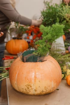 Creating a floral composition in a pumpkin. Making decor with your own hands