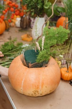 Creating a floral composition in a pumpkin. Making decor with your own hands