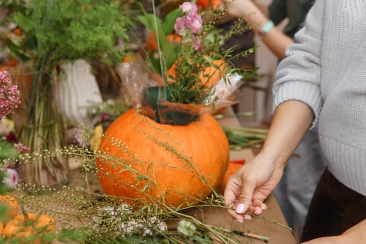Creating a floral composition in a pumpkin. Making decor with your own hands