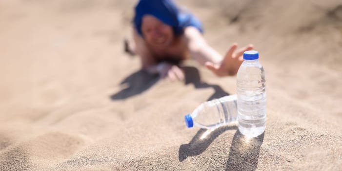 A man in the desert reaches for water bottles, close-up, blurry. Intense thirst for water, heat, dehydration