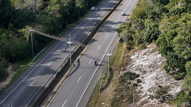 mata de sao joao, bahia, brazil - september 9, 2024: View of a wild animal flyover on the BA 099 highway in the Praia do Forte region.