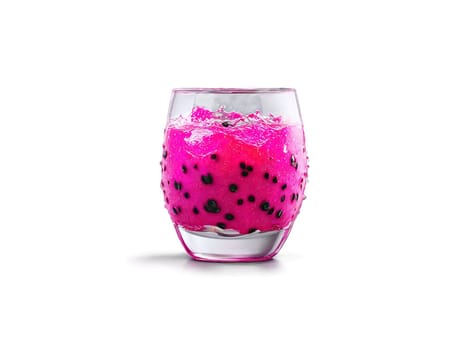 Dragon fruit soda in a novelty glass dragon fruit slices and kiwi exotic and vibrant. Drink isolated on transparent background.