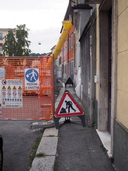 Cremona, Italy August 31st 2024 Road works sign indicating road closed for maintenance and construction, placed on a street