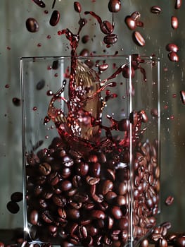 A glass of coffee with coffee beans in it