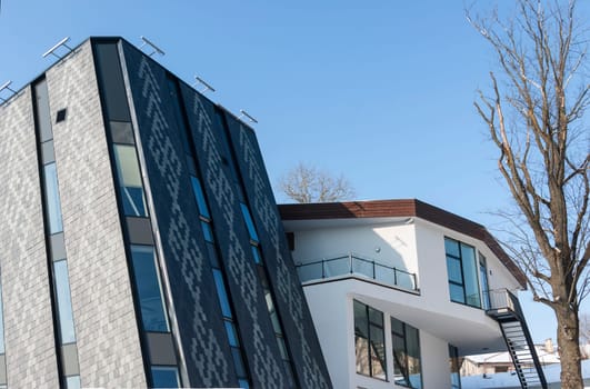 office building with white walls on blue sky