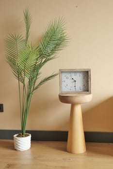 simple modern clock on table .