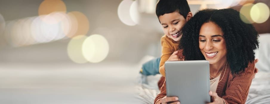 Bokeh, tablet or mother with child on a bed with mockup, social media or streaming subscription at home. Digital, space and mom with kid son in a bedroom happy, relax and online for movies or games.