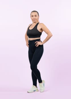 Active and fit physique senior woman portrait with happy smile on isolated background. Healthy lifelong senior people with fitness healthy and sporty body care lifestyle concept. Clout