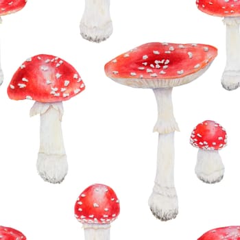 Watercolor seamless hand drawn pattern of fly agaric mushrooms.